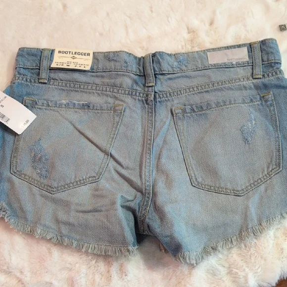 Ripped Light Blue Denim Shorts - Picture 4 of 6